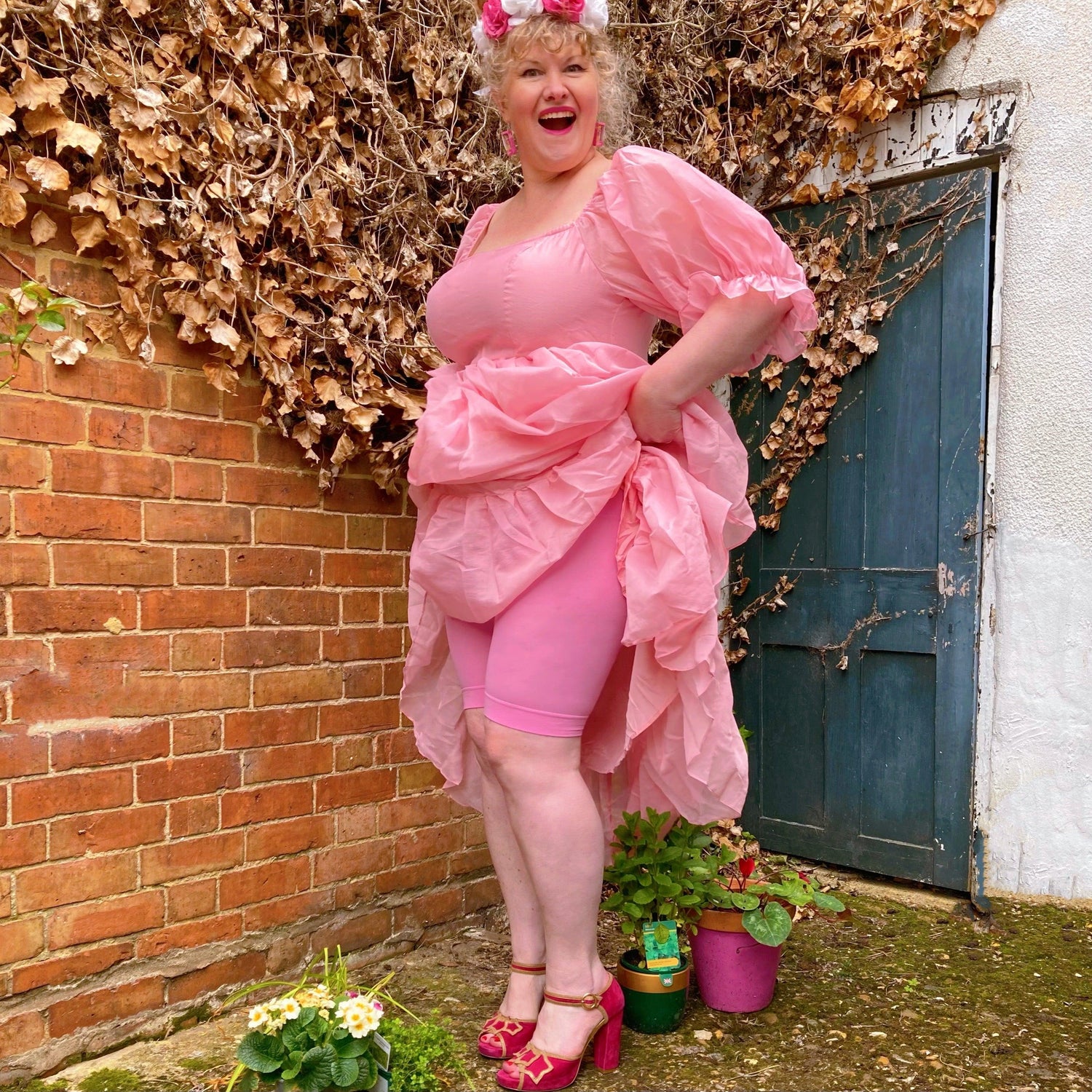 Woman wearing dragon fruit chub rub shorts