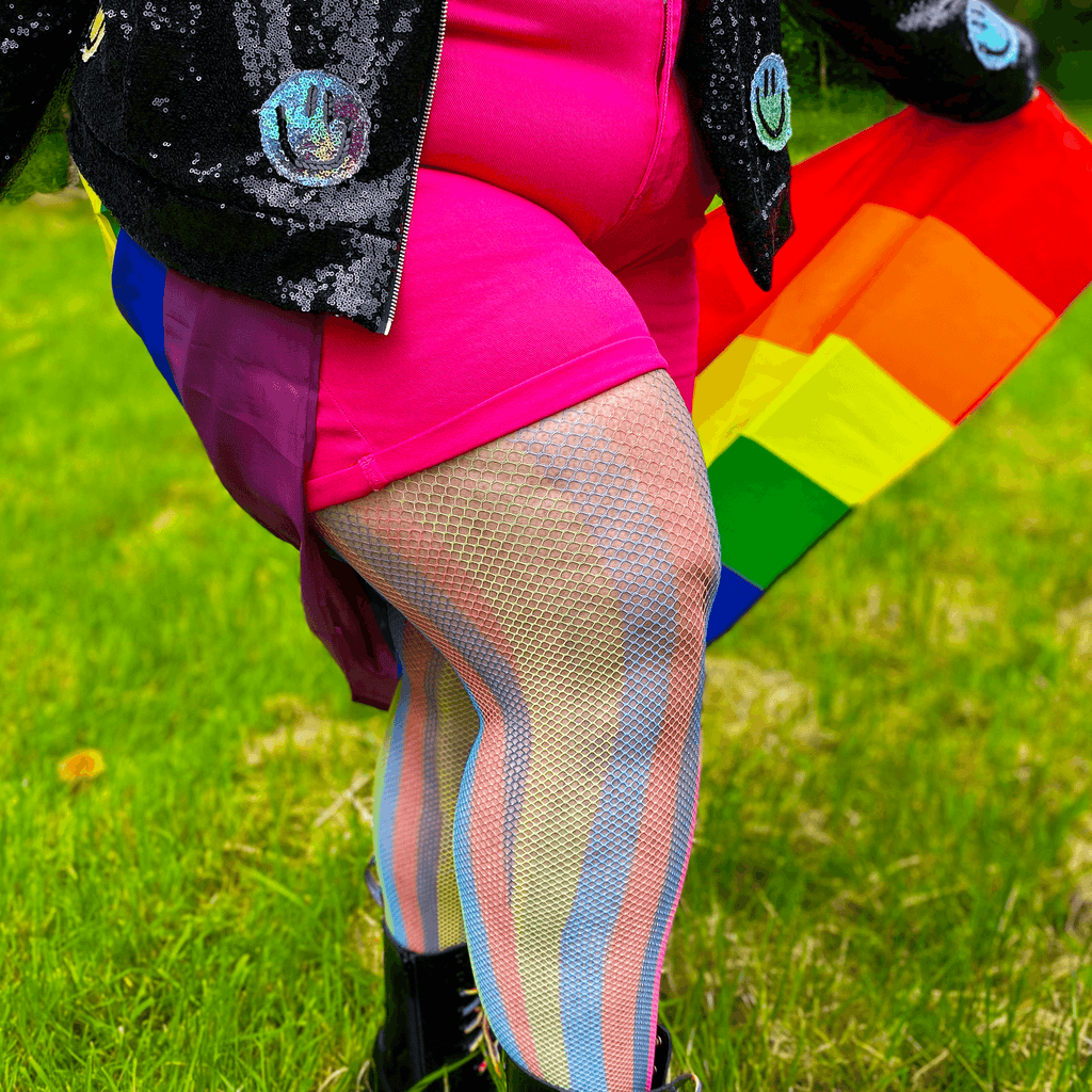 Model wearing rainbow coloured fishnets