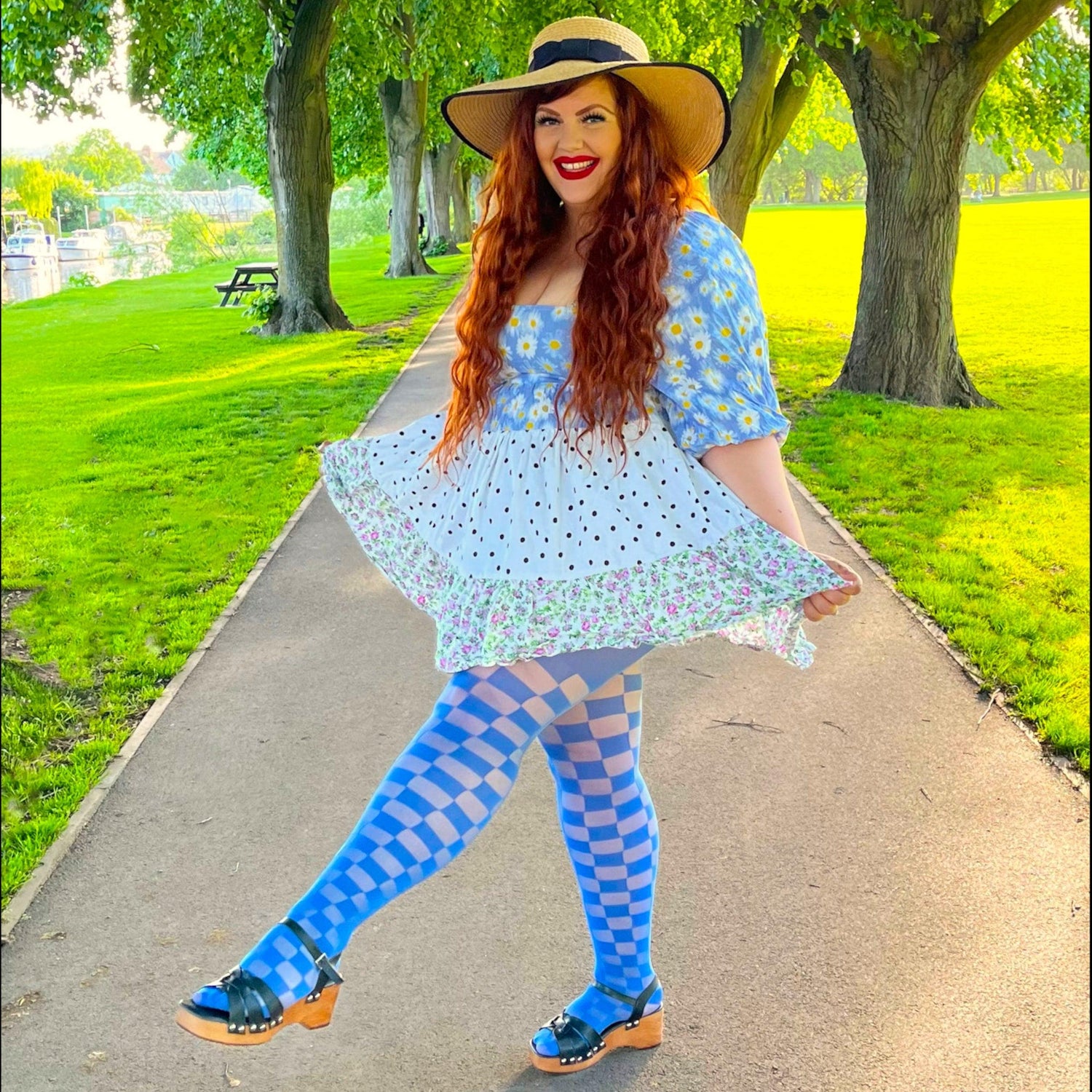 Woman wearing blue checkboard racy tights