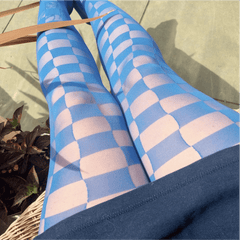 Woman wearing blue checkboard racy tights