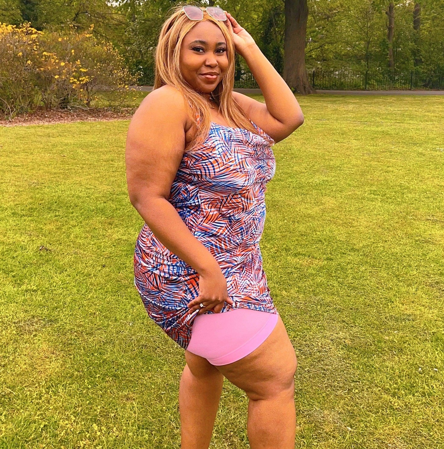 Woman wearing dragon fruit chub rub shorts